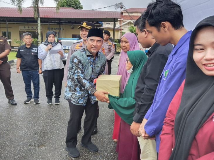 Ketua DPRD Kampar Apresiasi Baksos Polri Presisi Polres Kampar.