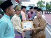 Semarak Hari Jadi ke-513 Bengkalis, Bupati Kasmarni Serahkan Hadiah Lomba Permainan Tradisional